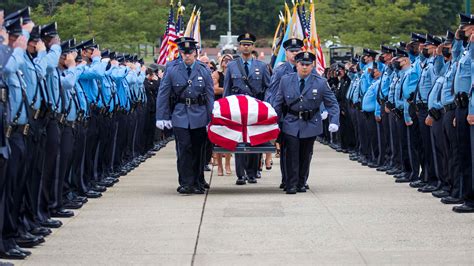 A public funeral service took place afterward from 11 a. . Police officer funeral procession today
